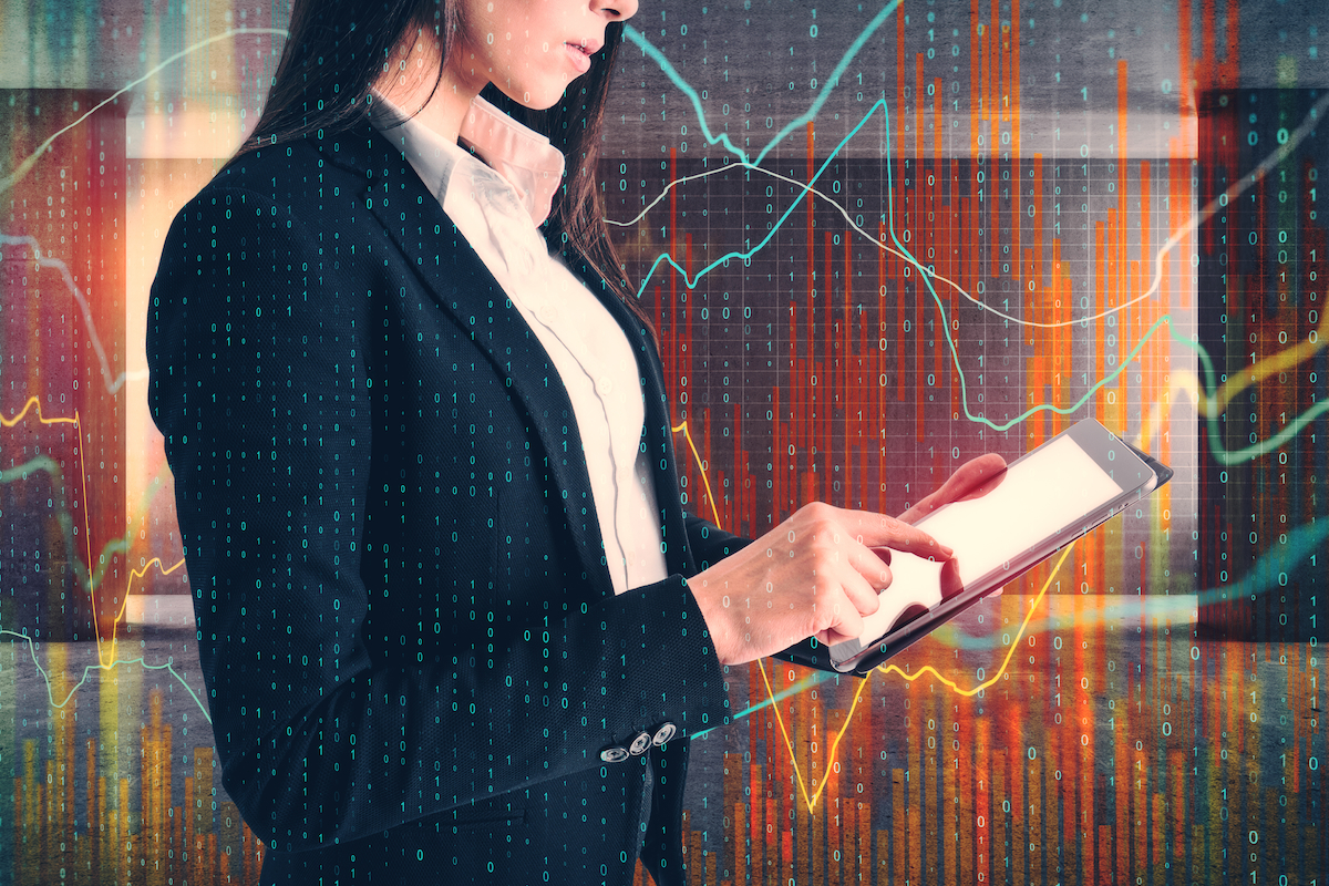 Side view of a woman looking at data